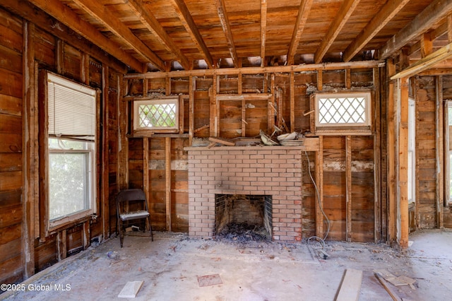 miscellaneous room featuring a brick fireplace