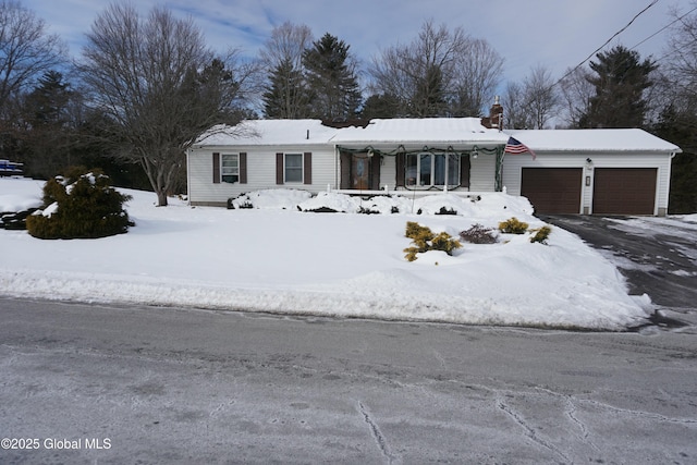 ranch-style house featuring a garage