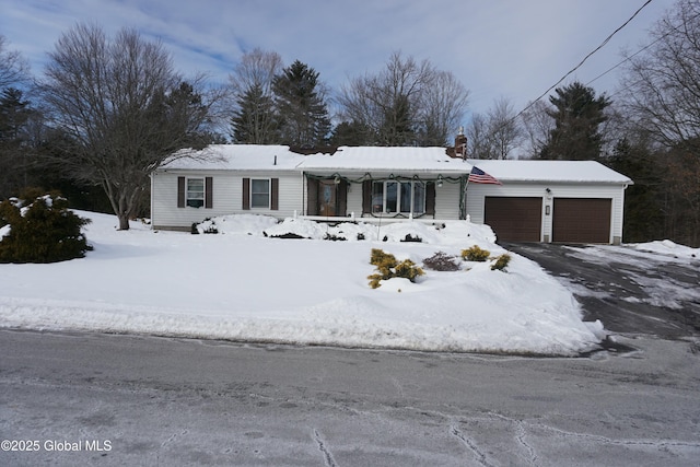 single story home with a garage