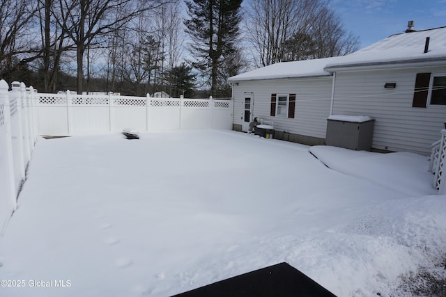 view of yard covered in snow