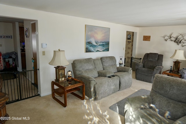 living room featuring light colored carpet