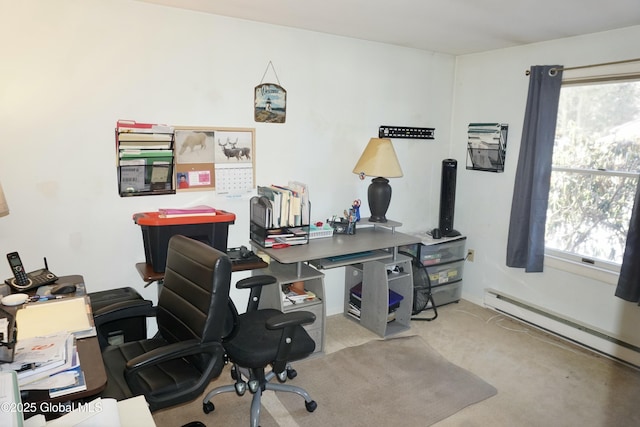 carpeted home office with a baseboard radiator