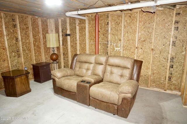 sitting room featuring concrete floors