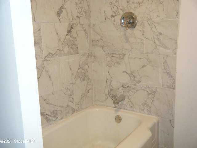 bathroom with a bathing tub