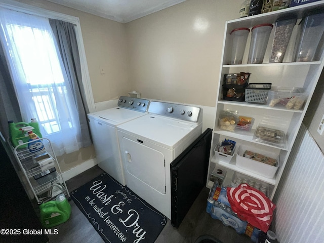 laundry room with separate washer and dryer