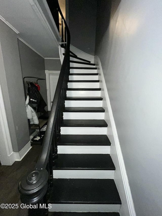 stairs featuring ornamental molding