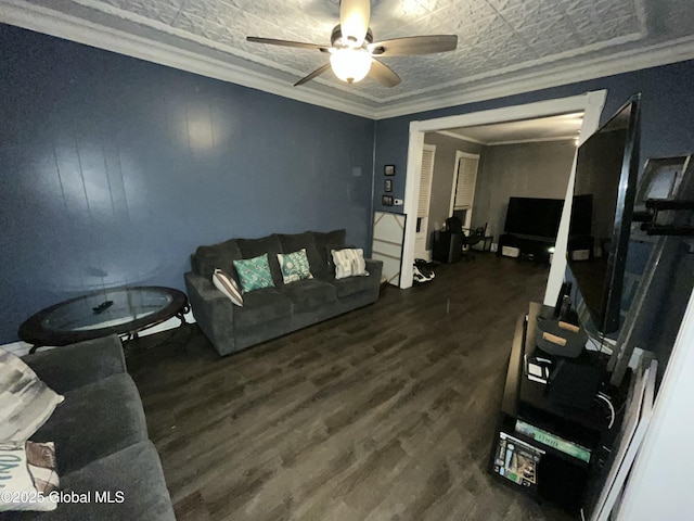 living room featuring crown molding, dark hardwood / wood-style floors, and ceiling fan