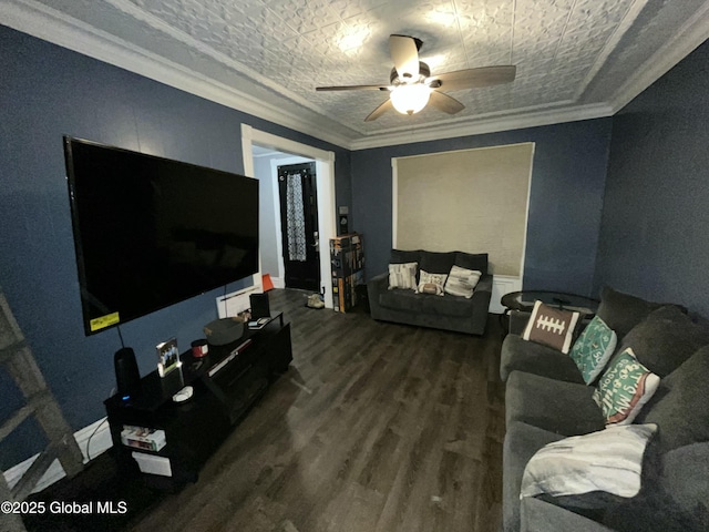 living room featuring ceiling fan, ornamental molding, and hardwood / wood-style floors