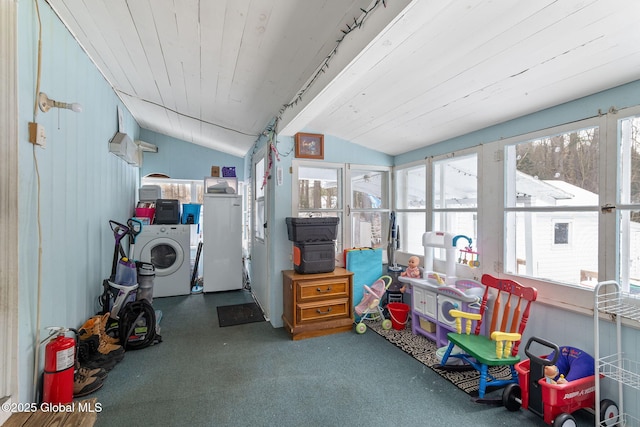 interior space featuring wood ceiling, vaulted ceiling, and independent washer and dryer