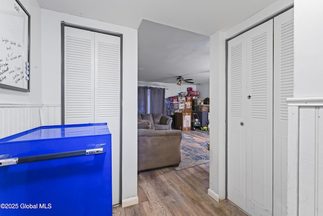 interior space featuring hardwood / wood-style floors and ceiling fan