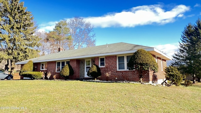 ranch-style home with a front yard