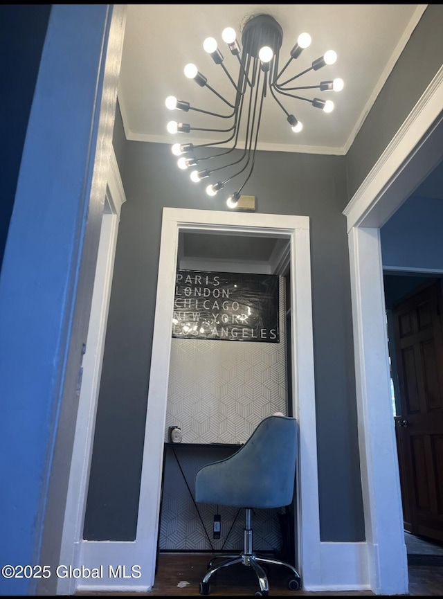 home office featuring a chandelier and ornamental molding