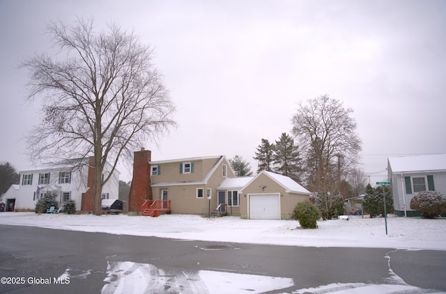 front of property with a garage