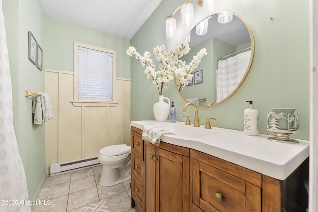 bathroom featuring toilet, tile patterned floors, vanity, and a baseboard heating unit