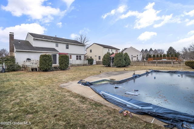 exterior space featuring a covered pool