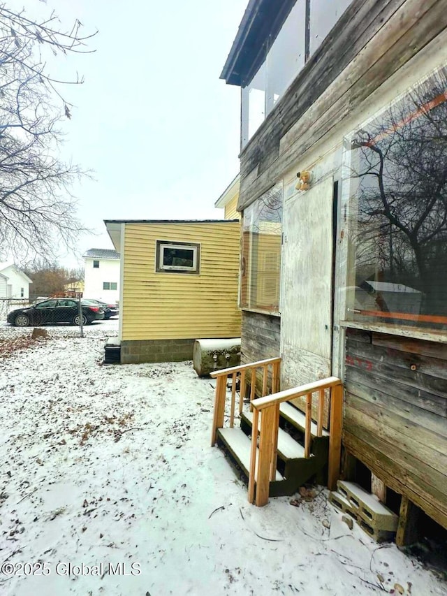 view of snow covered property