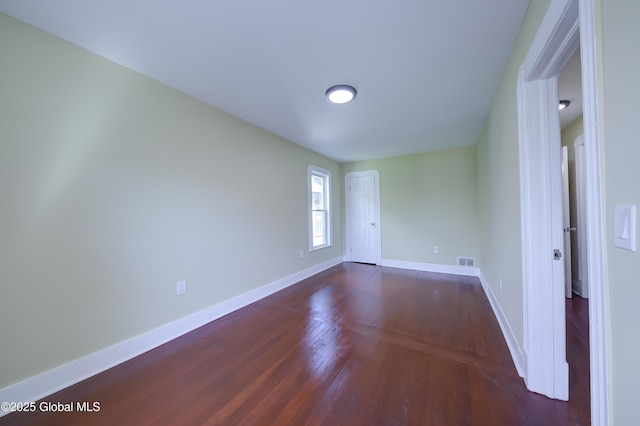 801 Holland Rd, Schenectady, NY 12303 - unfurnished room with dark wood-type flooring and baseboards