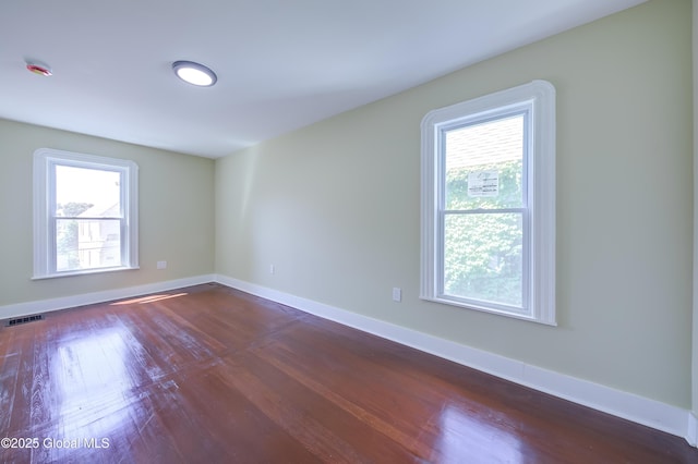 801 Holland Rd, Schenectady, NY 12303 - empty room featuring dark wood-style flooring and a smoke detector