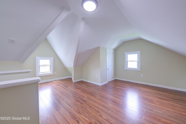 801 Holland Rd, Schenectady, NY 12303 - bonus room featuring wood finished floors and vaulted ceiling