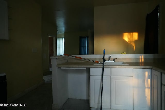 kitchen with white cabinets and sink