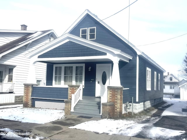 bungalow-style home featuring a porch