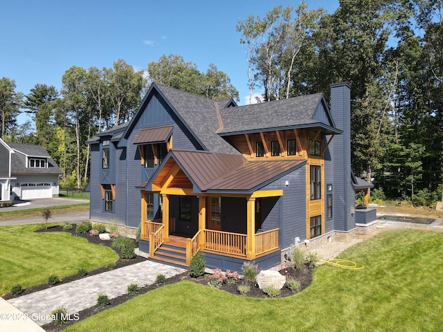 view of front of home featuring a front lawn and a porch