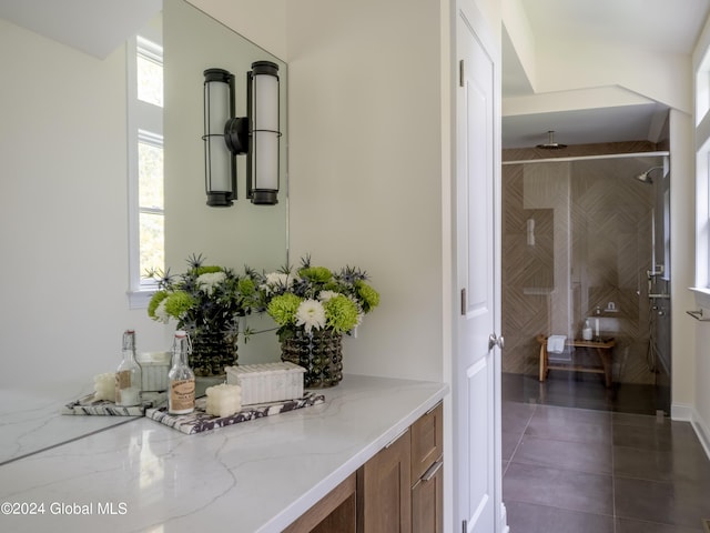 bathroom with vanity and walk in shower