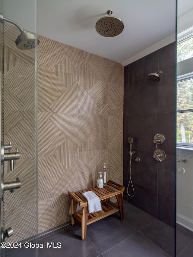 bathroom featuring tile patterned flooring and walk in shower