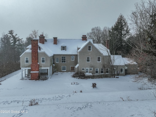 view of snow covered property