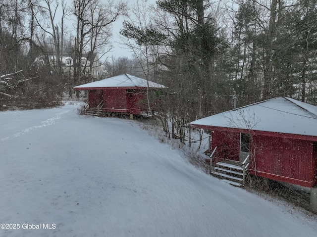 view of yard covered in snow