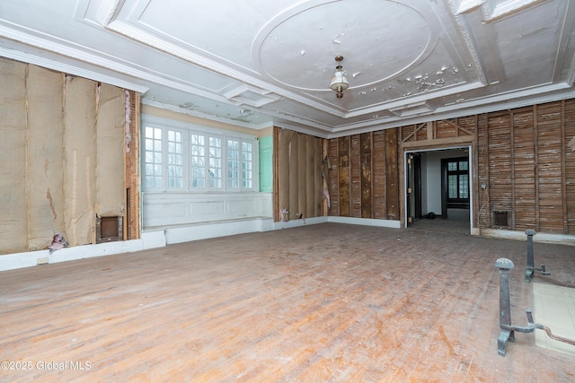 interior space with ornamental molding and coffered ceiling