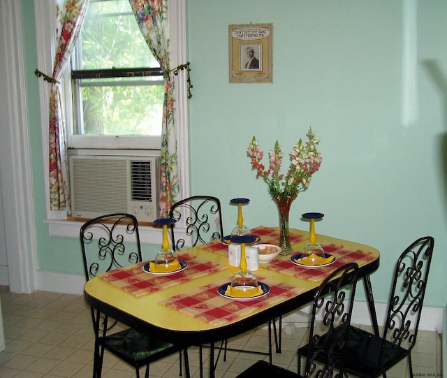 dining space featuring cooling unit