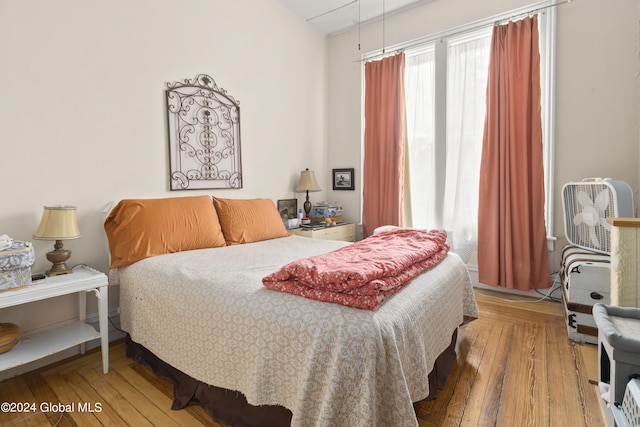 bedroom featuring wood-type flooring