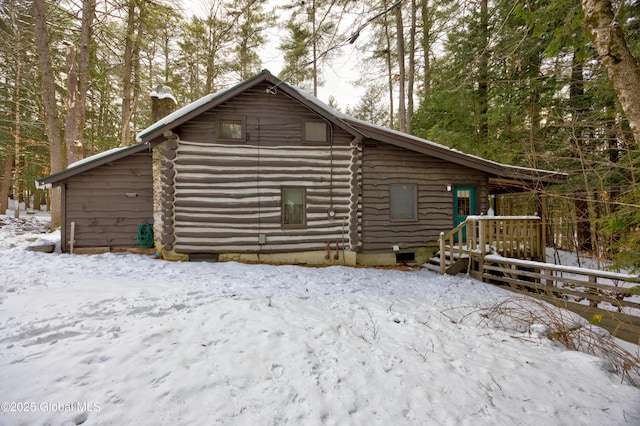 view of snow covered property