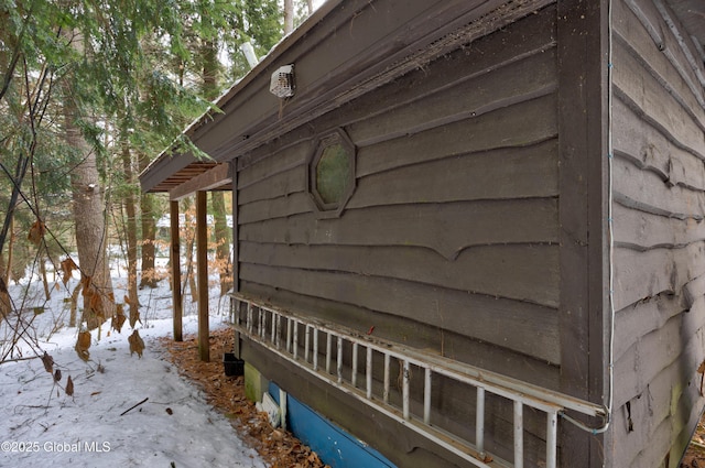 view of snow covered property