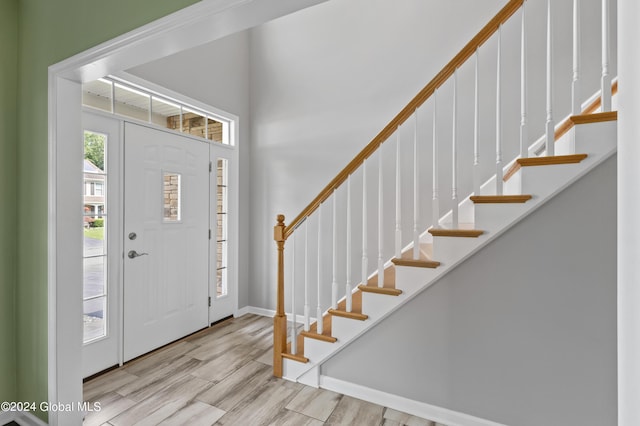 entrance foyer with light hardwood / wood-style flooring