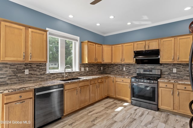 kitchen with light stone countertops, decorative backsplash, and stainless steel appliances