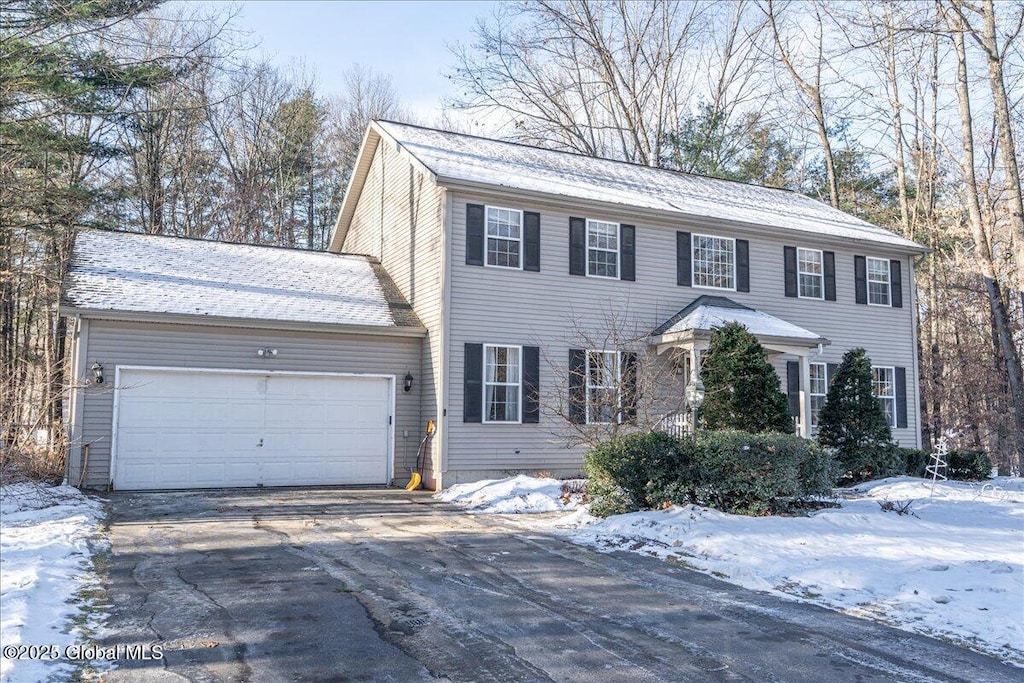 colonial-style house with a garage