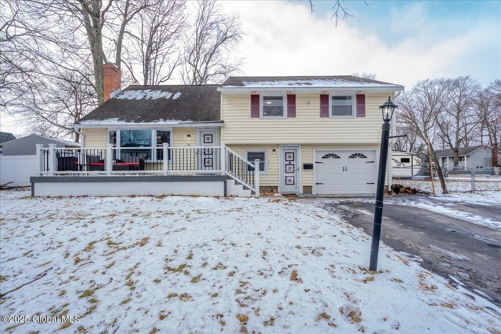 split level home with a garage