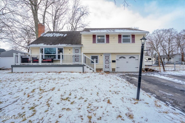 split level home with a garage