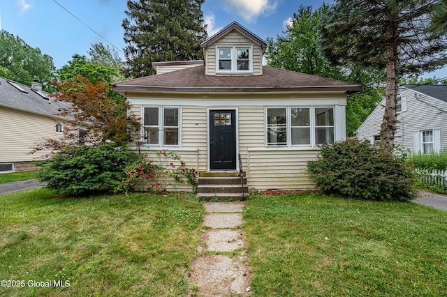 29 Lockrow Blvd, Colonie, NY 12205 - bungalow with entry steps, a front lawn, and roof with shingles