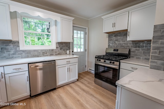 29 Lockrow Blvd, Colonie, NY 12205 - kitchen with appliances with stainless steel finishes, light wood-type flooring, white cabinetry, crown molding, and tasteful backsplash