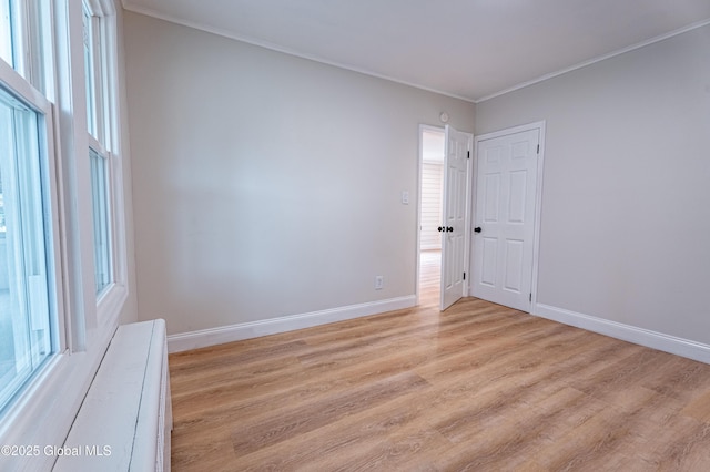 29 Lockrow Blvd, Colonie, NY 12205 - spare room featuring light wood-type flooring and ornamental molding