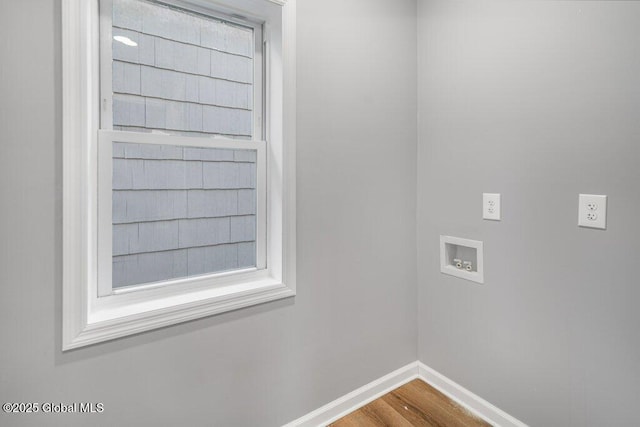 laundry area with washer hookup and hardwood / wood-style floors