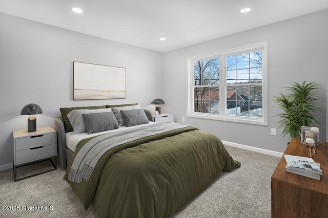 bedroom featuring light carpet