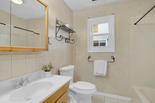 bathroom featuring decorative backsplash, tile patterned flooring, vanity, and toilet