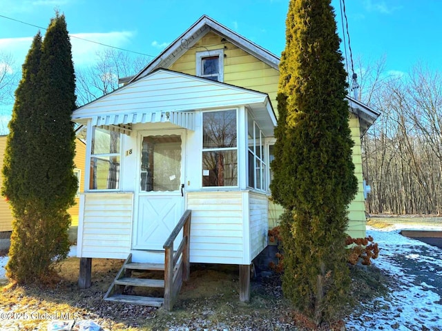 exterior space with a sunroom