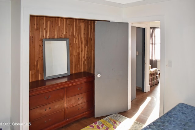 bedroom with hardwood / wood-style flooring