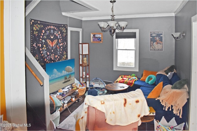 recreation room with an inviting chandelier and crown molding