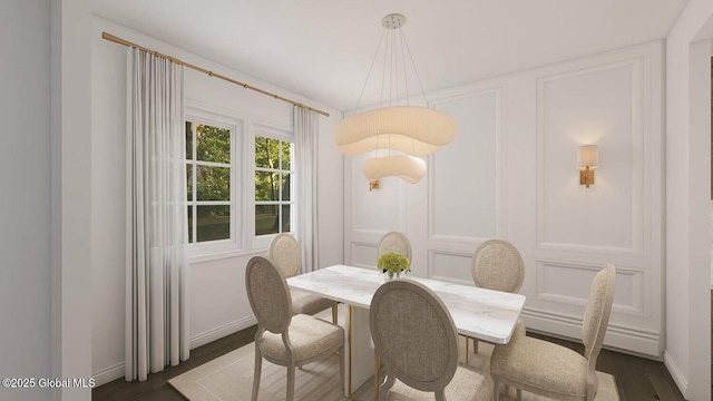 dining space featuring dark wood-type flooring